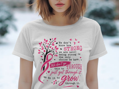 White t-shirt with breast cancer ribbon, tree, birds, and inspirational text.