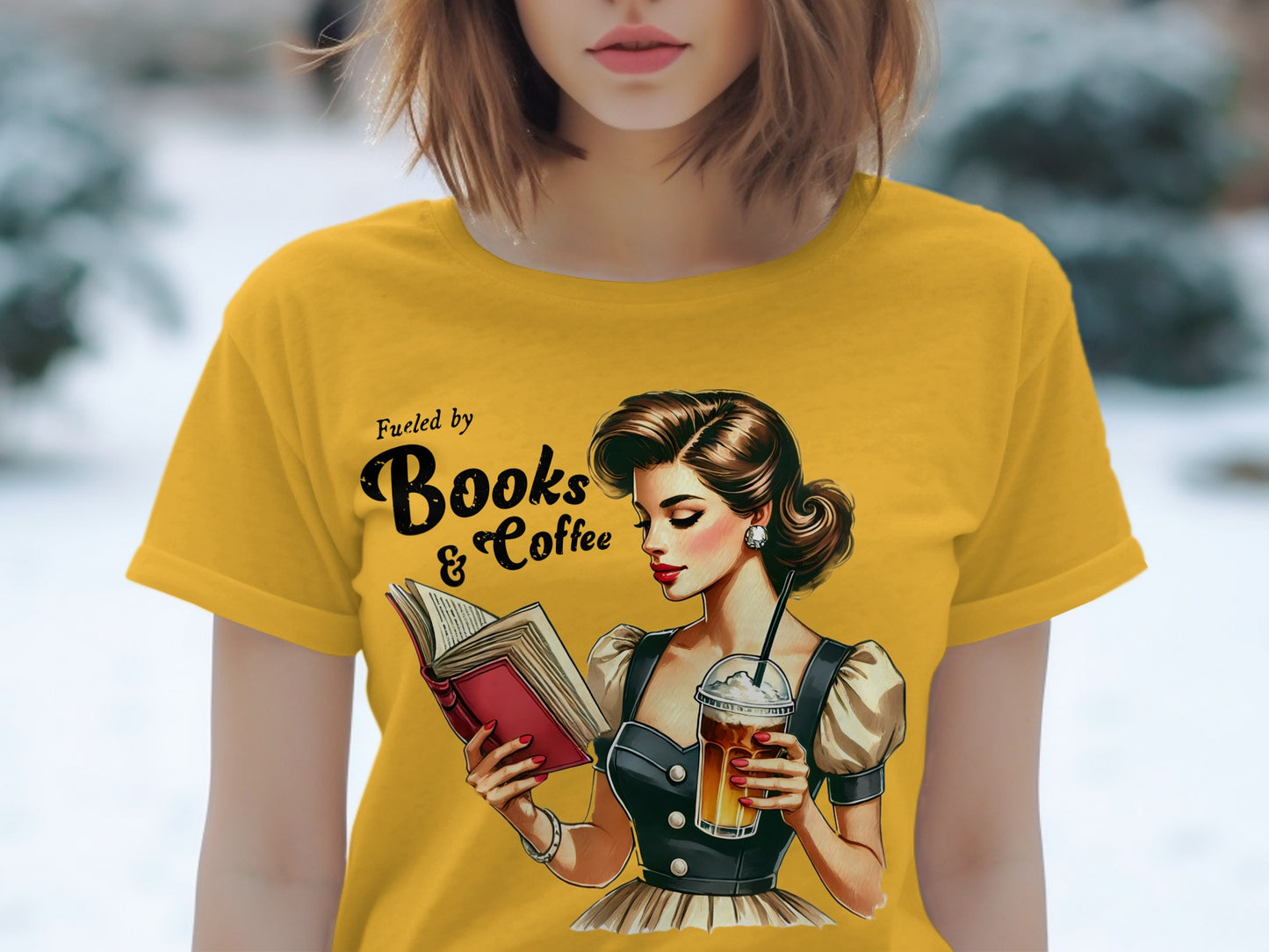 T-shirt with graphic "Fueled by Books & Coffee" and retro illustration.