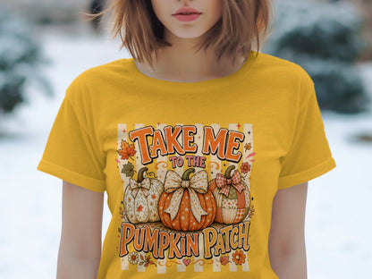 Yellow t-shirt with "Take Me To The Pumpkin Patch" text and three decorated pumpkins.