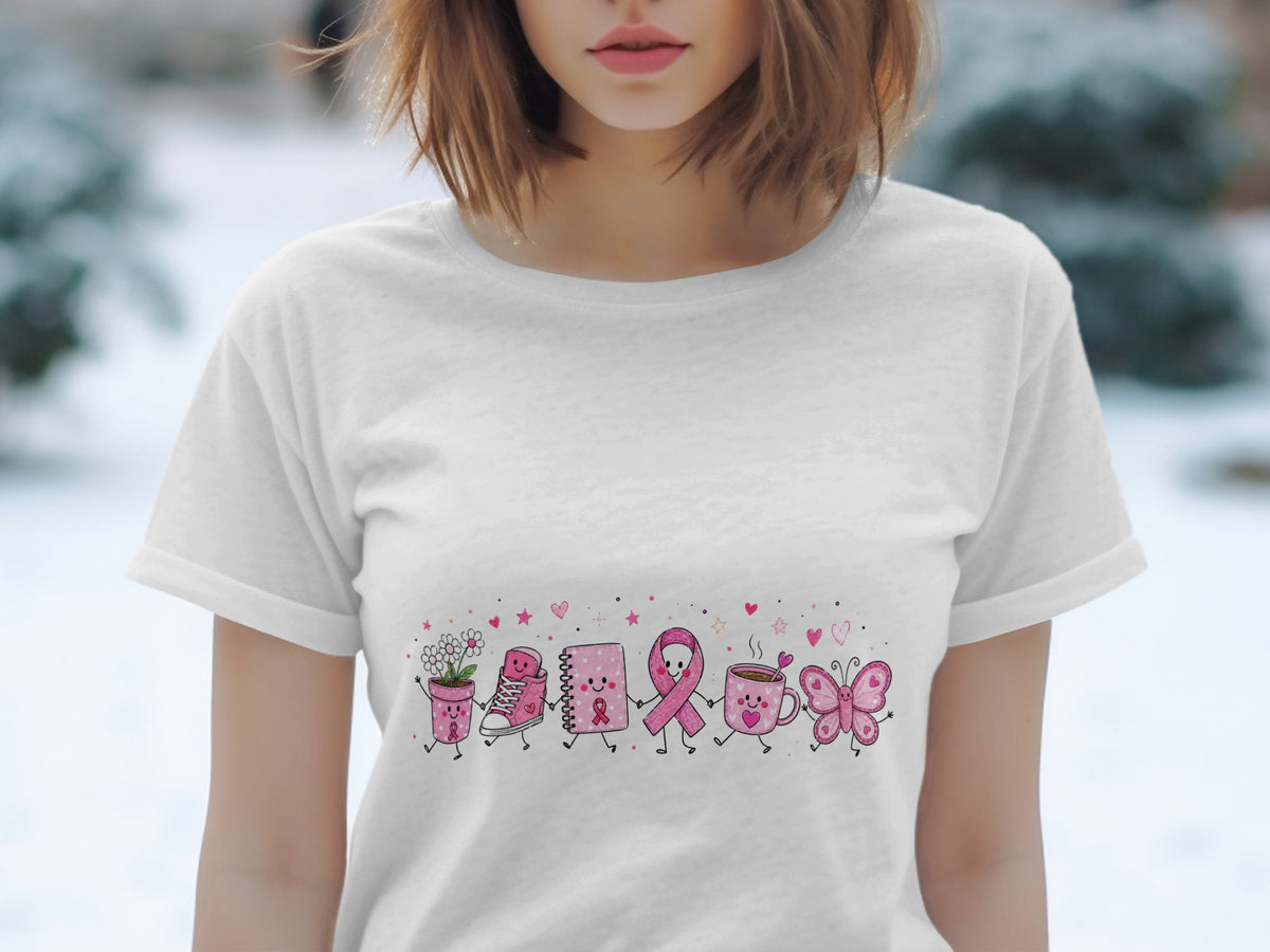 White t-shirt with a pink cartoon illustration of a plant, sneaker, notebook, ribbon, coffee cup, and butterfly.