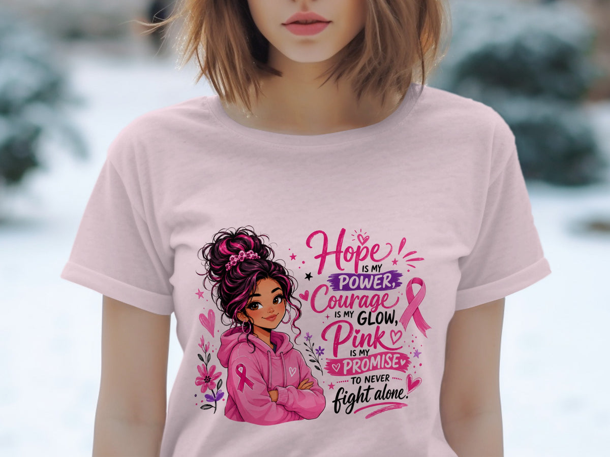 Pink t-shirt with illustration of girl and breast cancer awareness text.