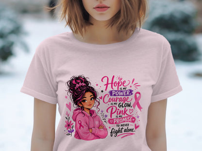 Pink t-shirt with illustration of girl and breast cancer awareness text.