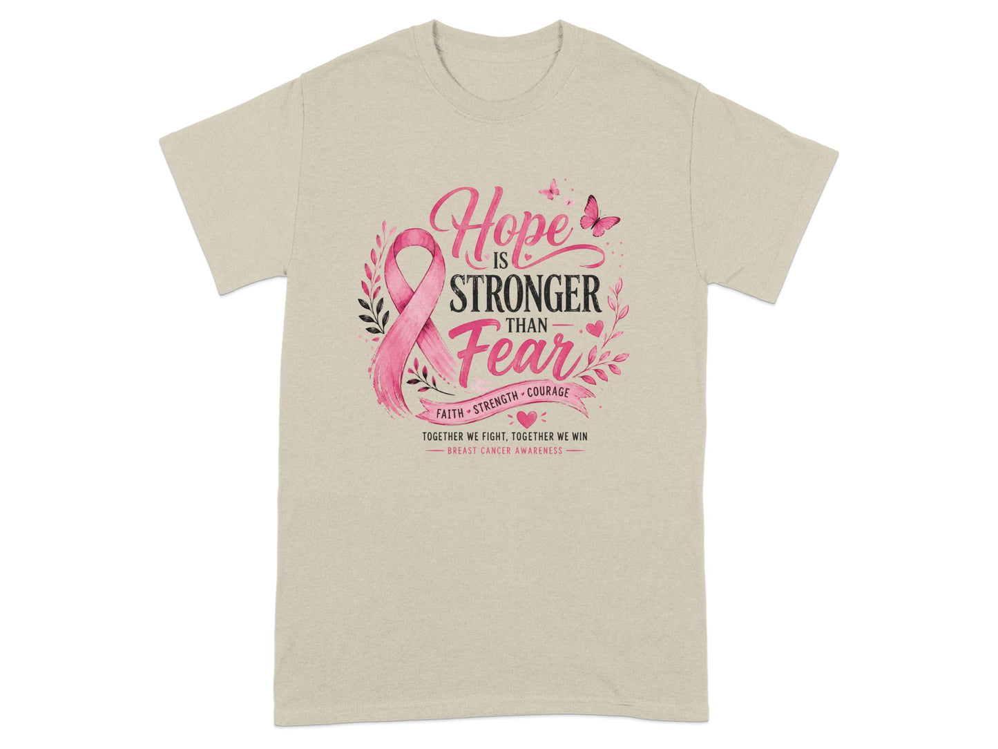 Tan t-shirt with pink ribbon and "Hope is Stronger Than Fear" breast cancer awareness text.