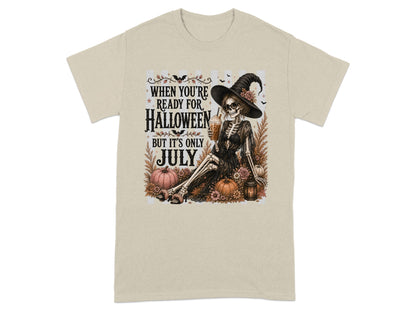Skeleton witch with drink and text "When you're ready for Halloween but it's only July".