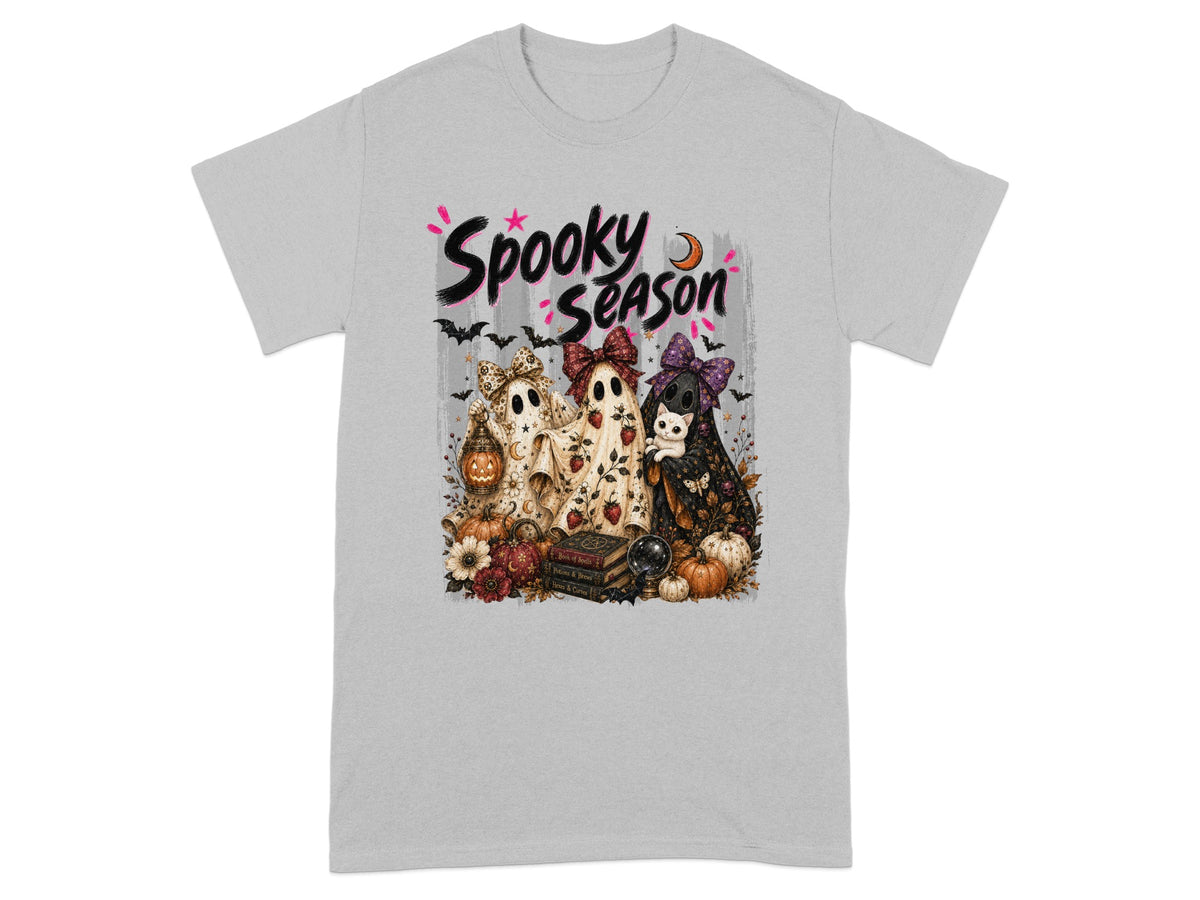 "Spooky Season" text with three ghosts, pumpkins, and bats on a t-shirt.