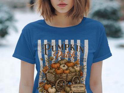 Blue t-shirt with a "Pumpkin Patch" design featuring a wagon of pumpkins and autumn leaves.