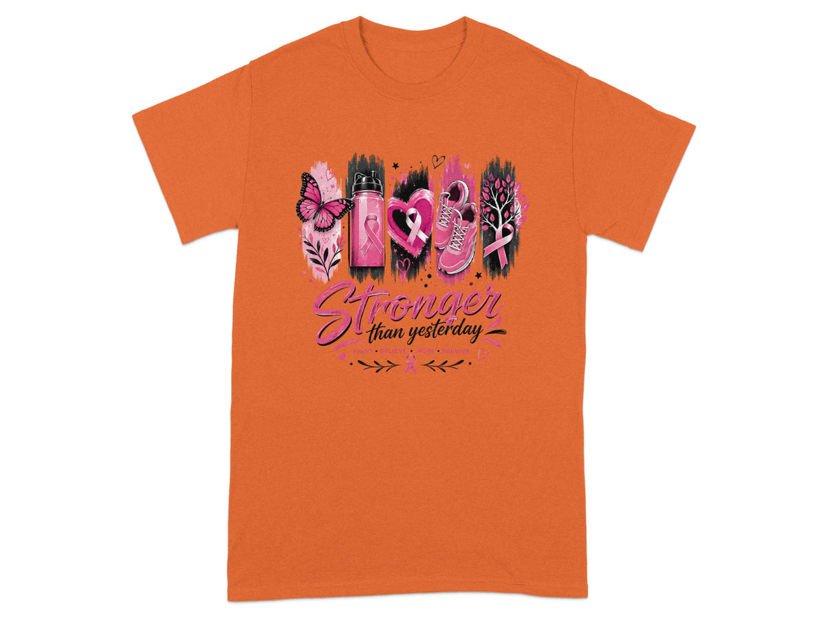 Orange t-shirt with graphic: butterfly, water bottle, pink ribbon, running shoes, tree, text "Stronger than yesterday."