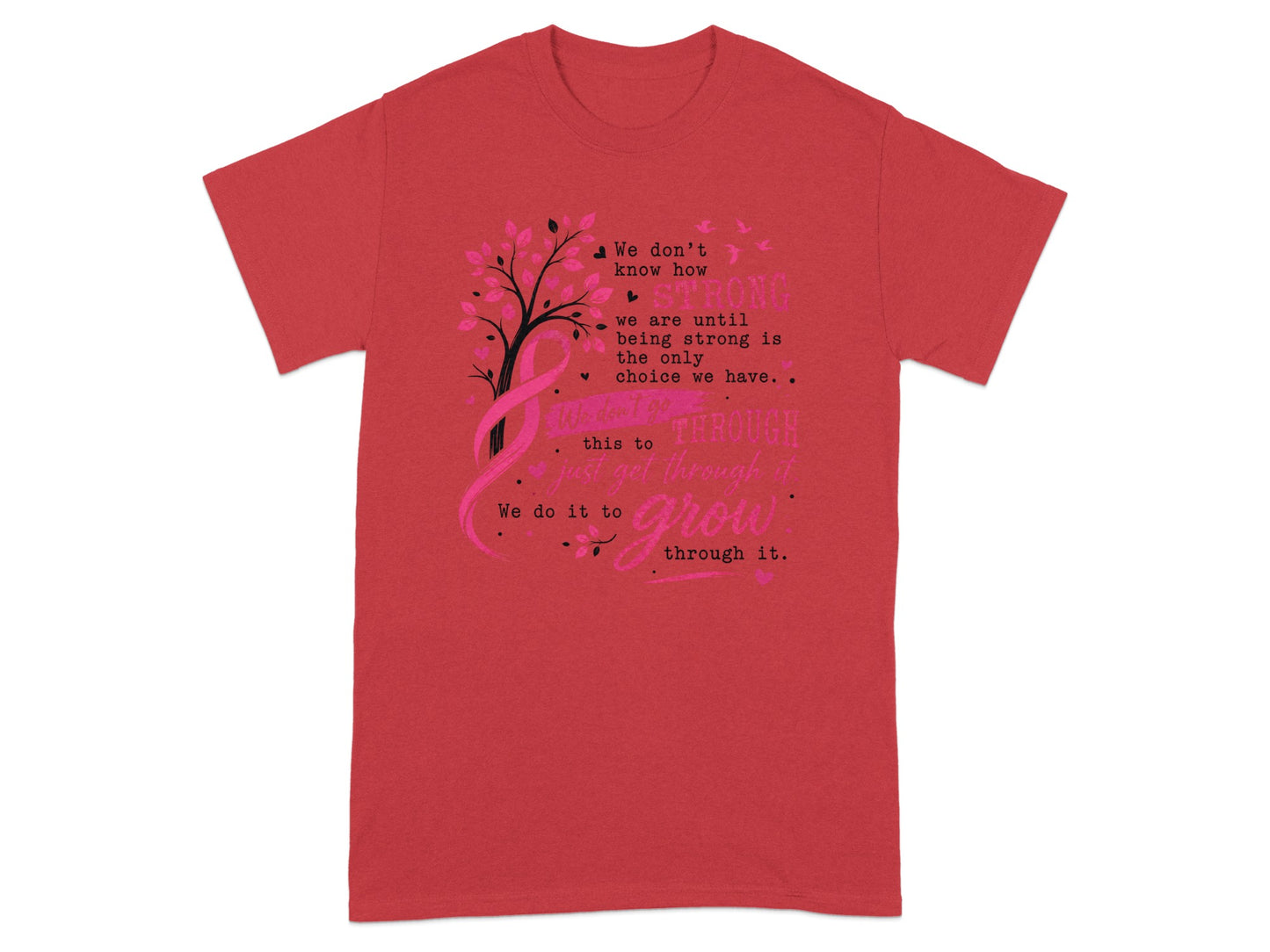 Red t-shirt with a pink ribbon, tree, and inspirational text about being strong and growing.
