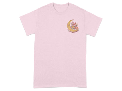 Pink t-shirt with crescent moon, flowers, and text "Take a moment to breathe".