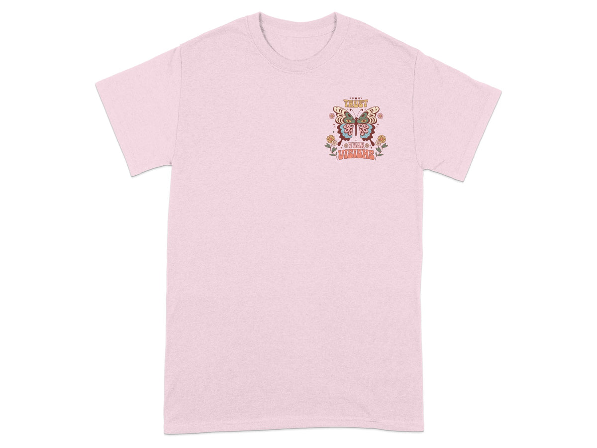 Pink t-shirt with a butterfly graphic and text "TRUST YOUR VISIONS".