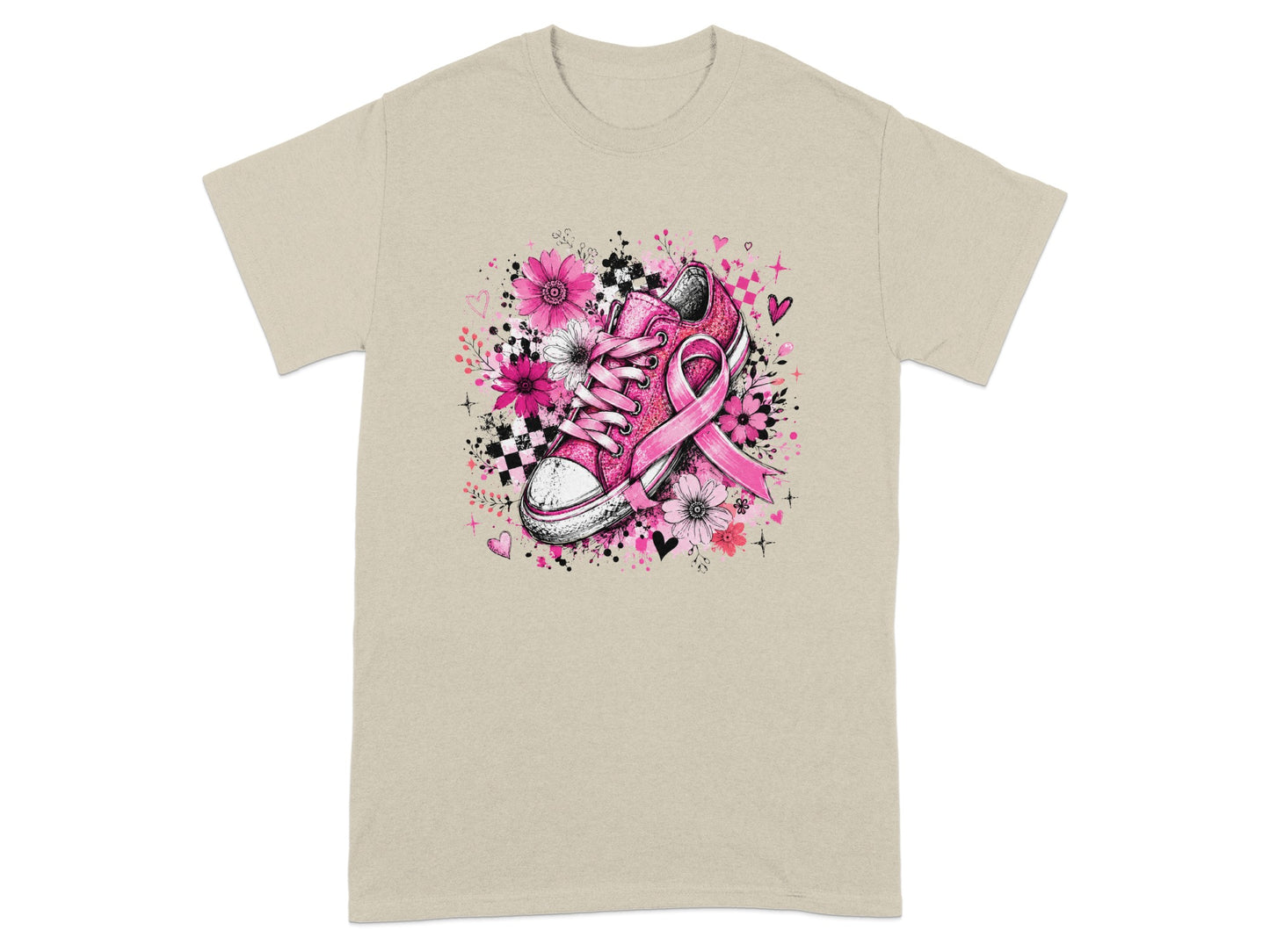 Pink sneaker with floral design and breast cancer ribbon on tan t-shirt.