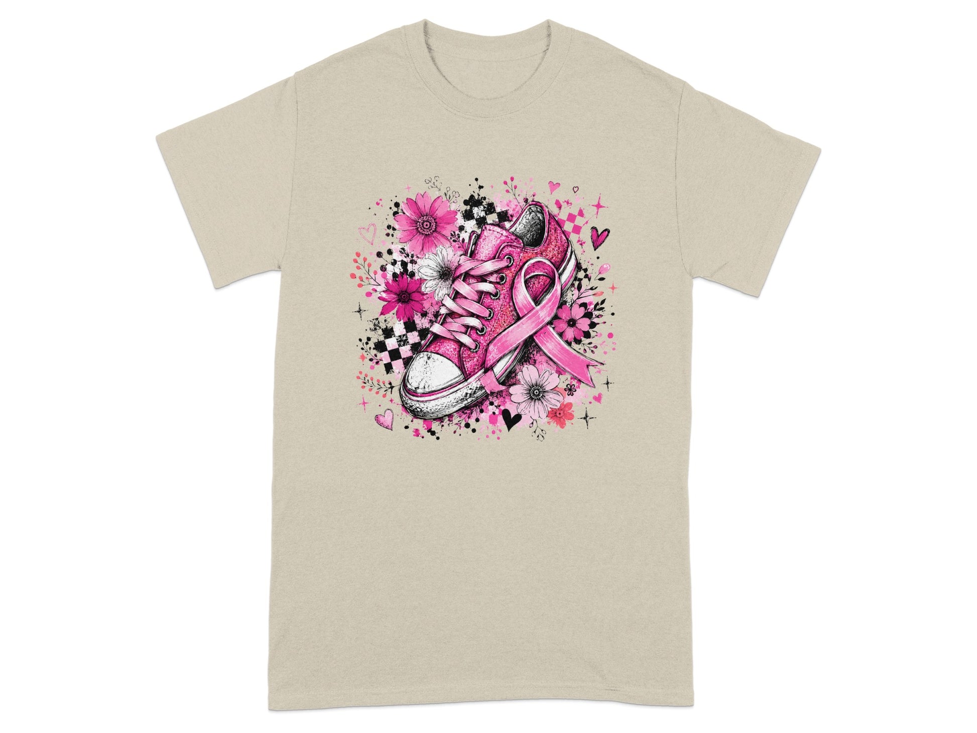 Pink sneaker with floral design and breast cancer ribbon on tan t-shirt.