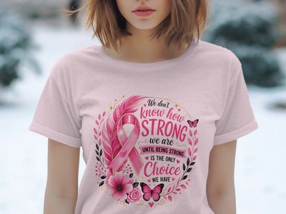 Pink t-shirt with breast cancer ribbon and quote: "We don't know how strong we are until being strong is the only choice we have."