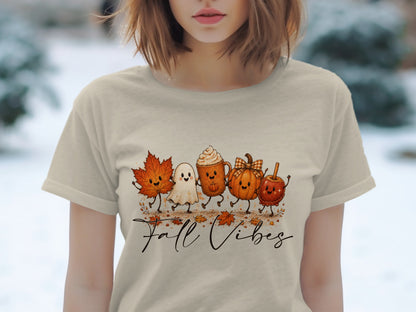 T-shirt graphic with "Fall Vibes" text and animated fall characters.