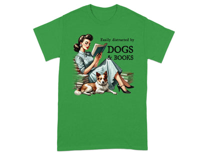 Green t-shirt with vintage illustration of woman reading, dog, and books, text "Easily distracted by DOGS & BOOKS".