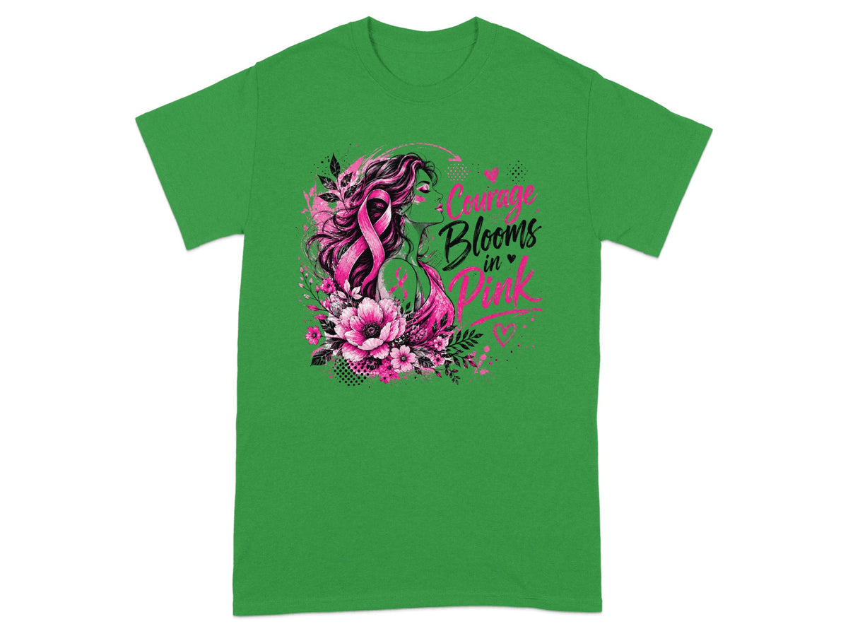 Green t-shirt with a design of a woman's profile, pink ribbon, flowers, and text "Courage Blooms in Pink".