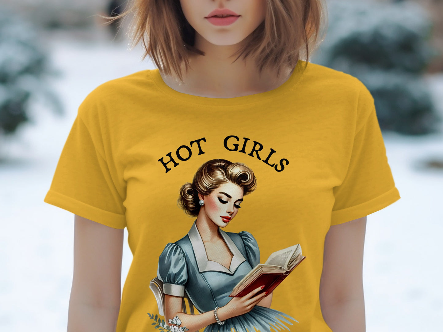 Yellow t-shirt with "HOT GIRLS" text and vintage pin-up style woman reading.