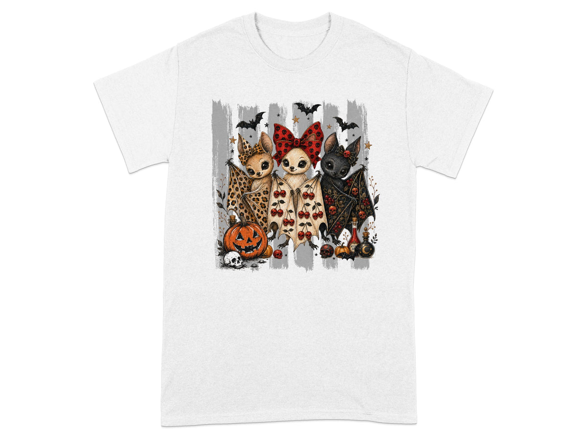 Three cartoon bats with Halloween decorations and a pumpkin.