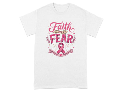 White t-shirt with pink "Faith Over Fear" text, pink ribbon, and inspirational phrases.