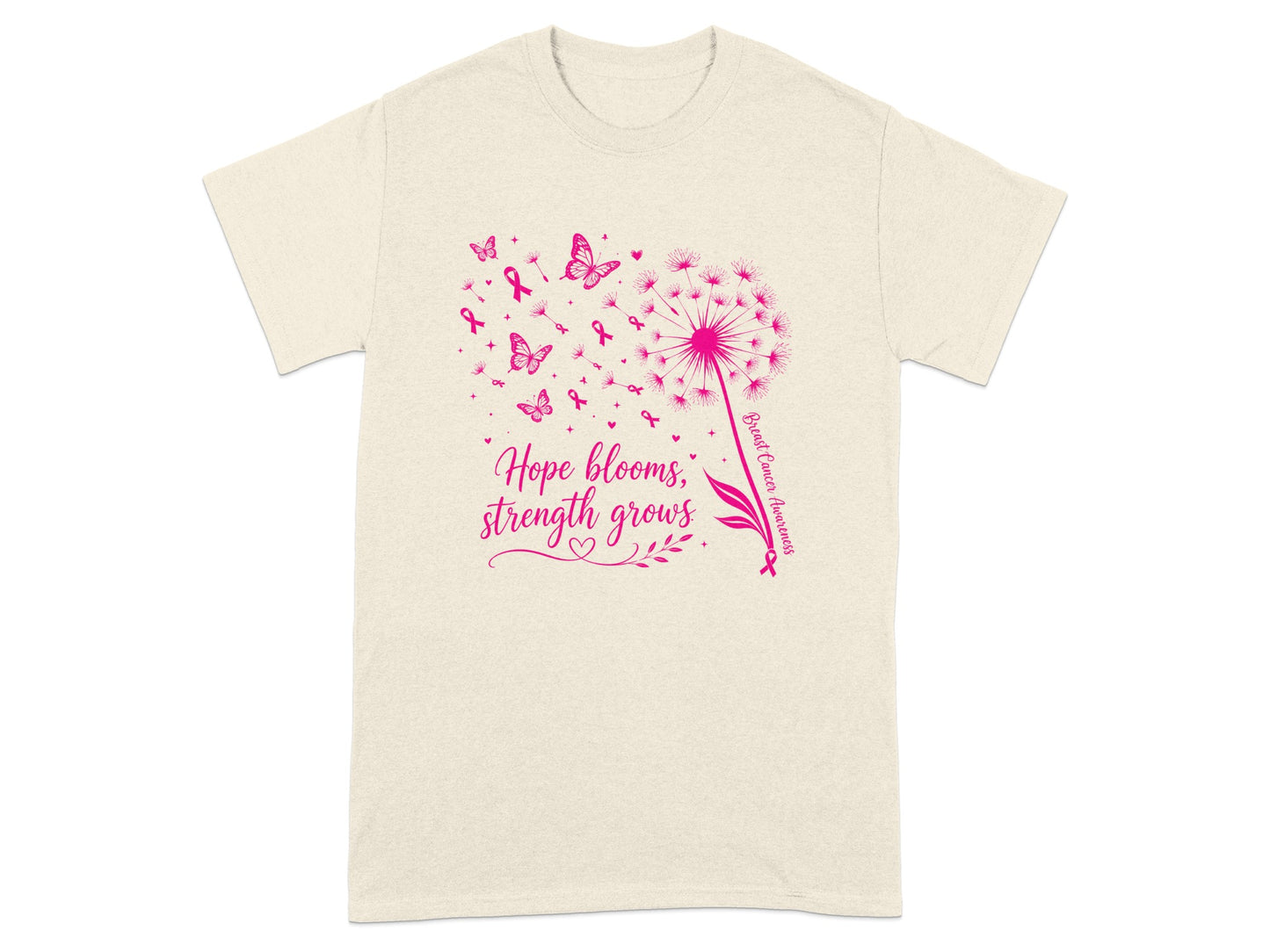 Cream t-shirt with pink dandelion, butterflies, ribbons, and text "Hope blooms, strength grows."