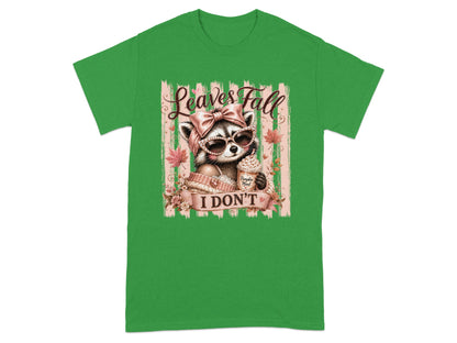 Raccoon wearing sunglasses and holding pumpkin spice latte, with "Leaves Fall I Don't" text.