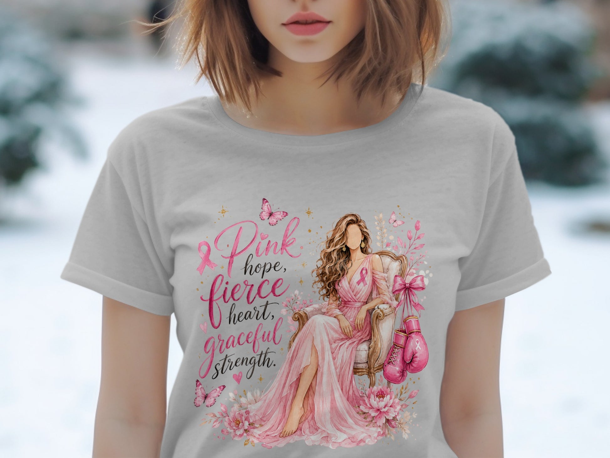 T-shirt graphic: woman in pink dress, boxing gloves, text "Pink hope, fierce heart, graceful strength".