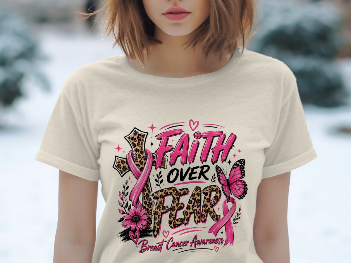 T-shirt with "Faith Over Fear Breast Cancer Awareness" text, cross, ribbon, and butterfly.
