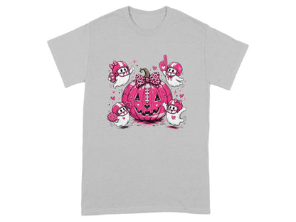 Pink pumpkin with football-themed ghosts and football accents.