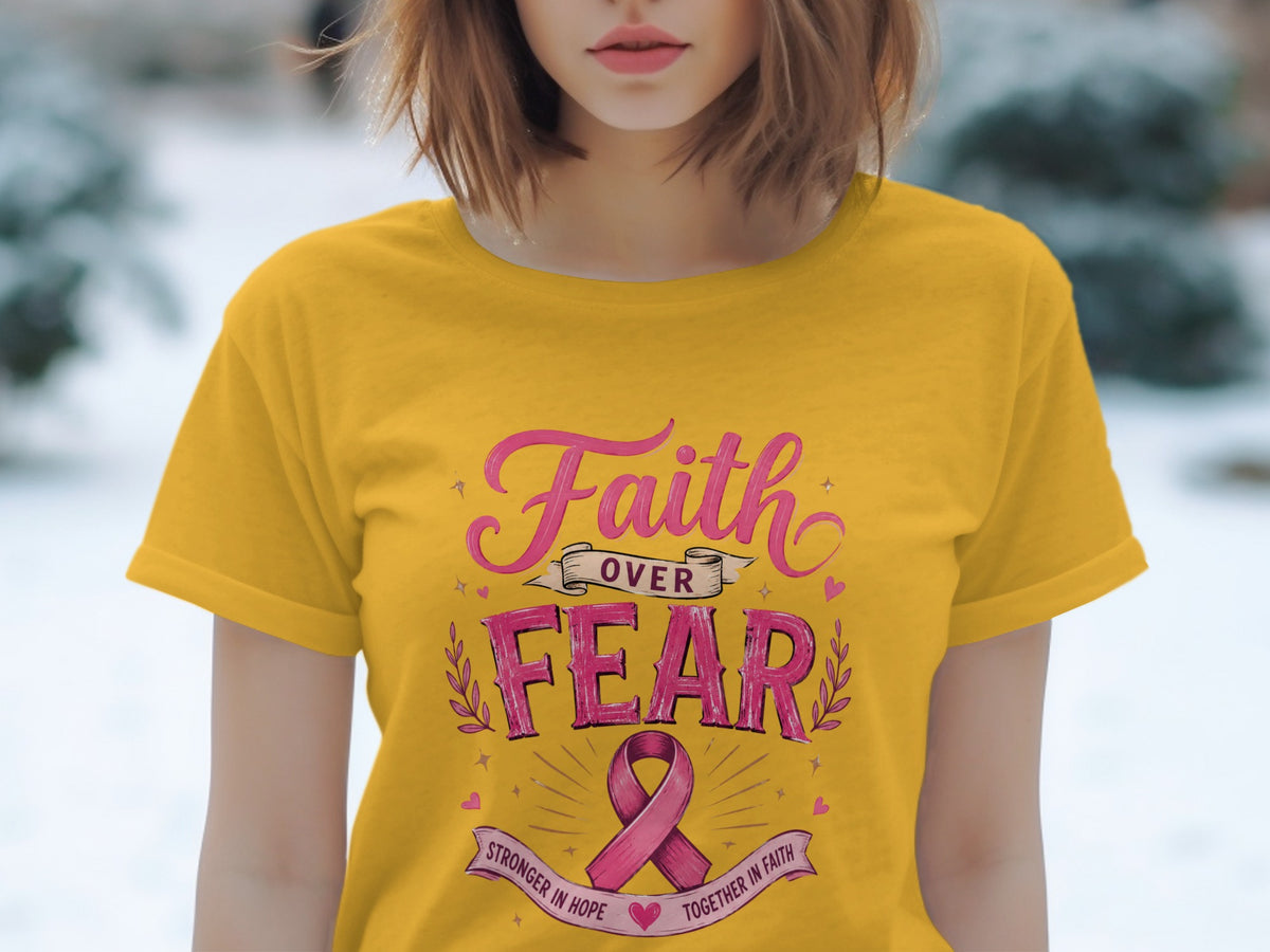 Yellow t-shirt with "Faith Over Fear" and a pink ribbon design.