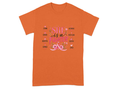 Orange t-shirt with "SHE is a FIGHTER" and descriptive words like STRONG, VICTORIOUS, LOVED.