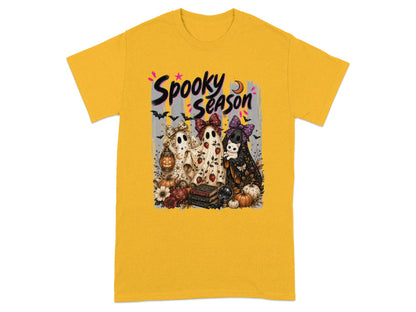 Yellow t-shirt with "Spooky Season" graphic featuring three ghosts and Halloween elements.