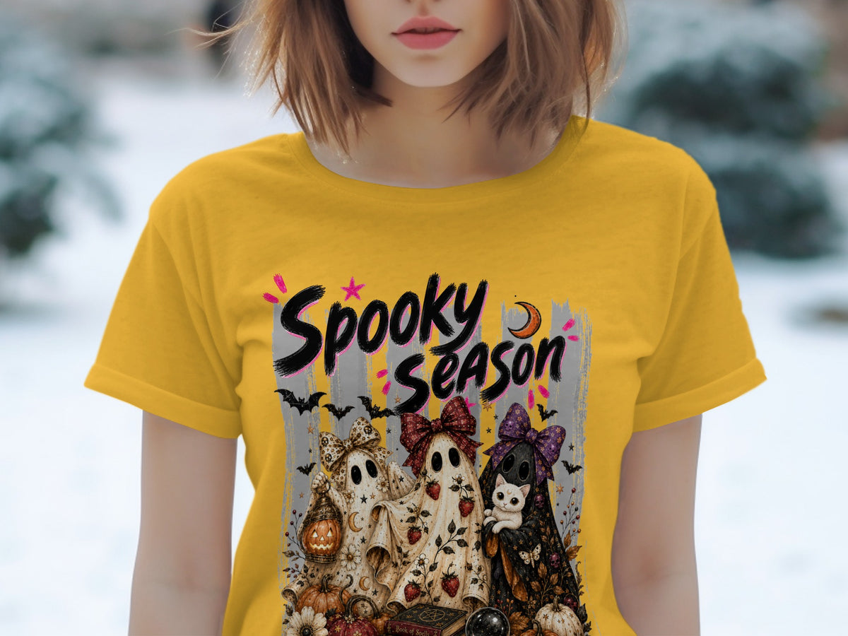 Yellow t-shirt with "Spooky Season" graphic featuring ghosts, pumpkins, and a cat.