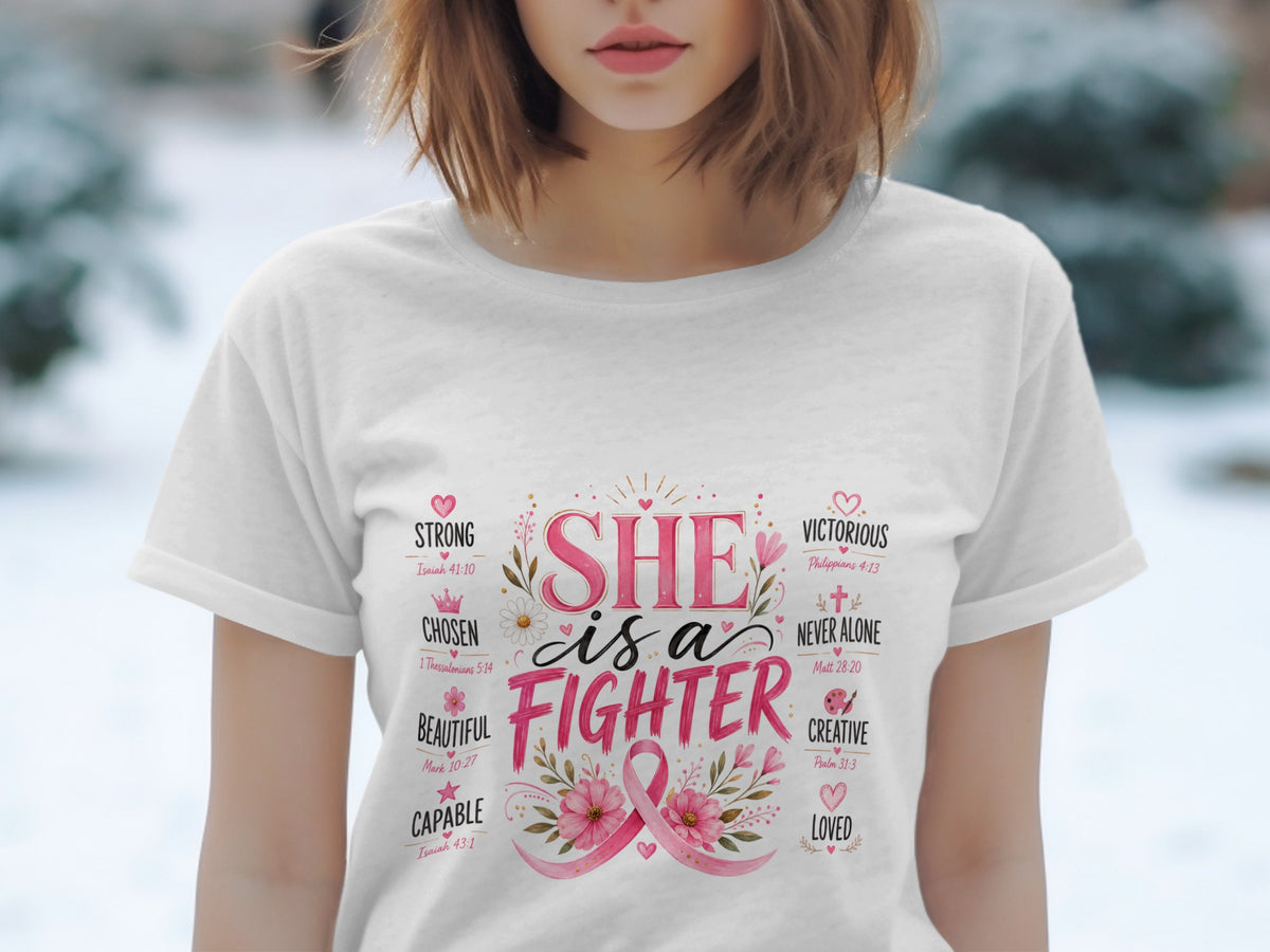 White t-shirt with "She is a Fighter" and positive words in pink lettering.