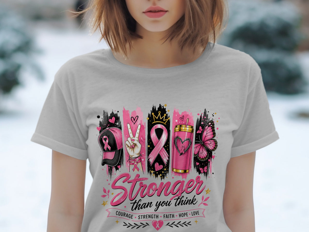 T-shirt graphic with breast cancer awareness symbols and text: "Stronger than you think".