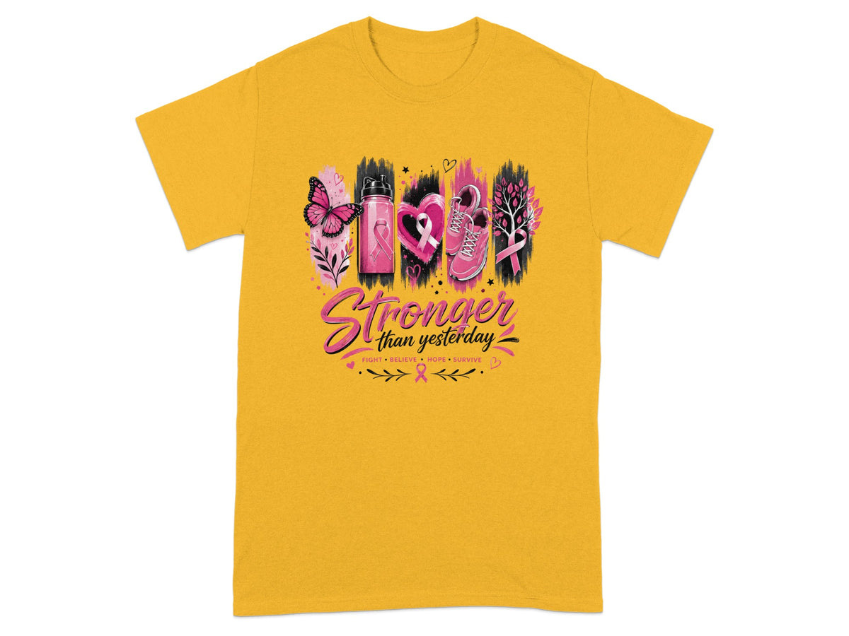 Yellow t-shirt with "Stronger than yesterday" graphic featuring breast cancer ribbons.