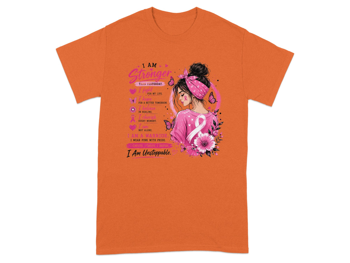 Orange t-shirt with graphic of a woman and text about being stronger.