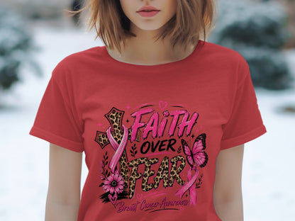 Red t-shirt with "Faith Over Fear" breast cancer awareness graphic.