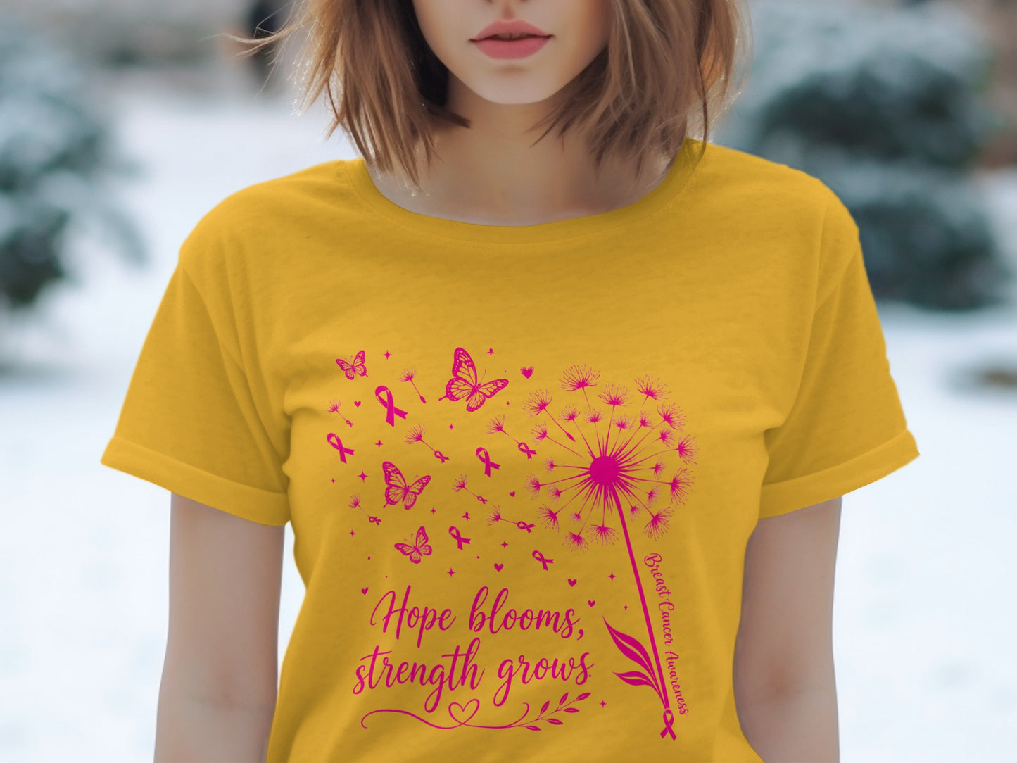 Yellow t-shirt with pink dandelion, butterflies, and "Hope blooms, strength grows" text.