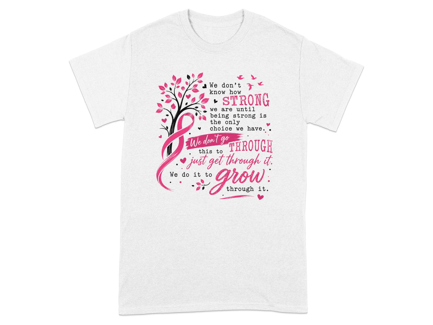 T-shirt with pink ribbon, tree, and text about strength and growth.