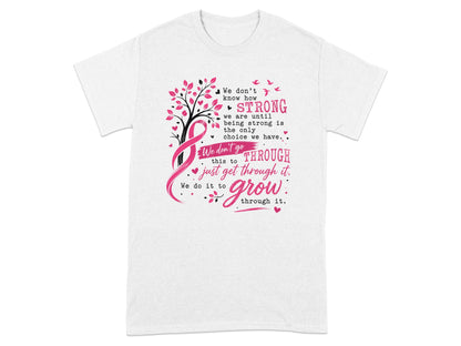T-shirt with pink ribbon, tree, and text about strength and growth.