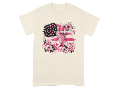 Cream t-shirt with distressed US flag, pink ribbon, and floral graphic.