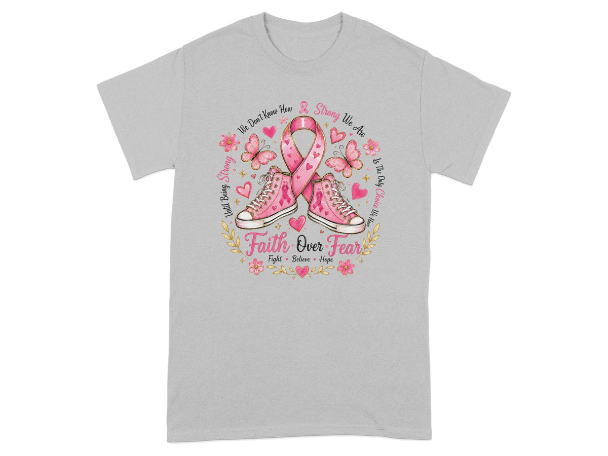 Pink sneakers, ribbon, butterflies, and "Faith Over Fear" text on a gray t-shirt.