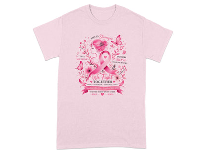 Pink t-shirt with "She is Stronger and More Brave Than She Thinks" and breast cancer ribbon.