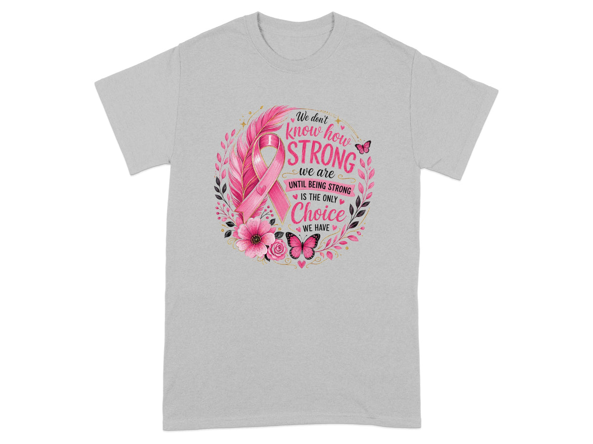 Gray t-shirt with pink ribbon, floral design, and text about strength.