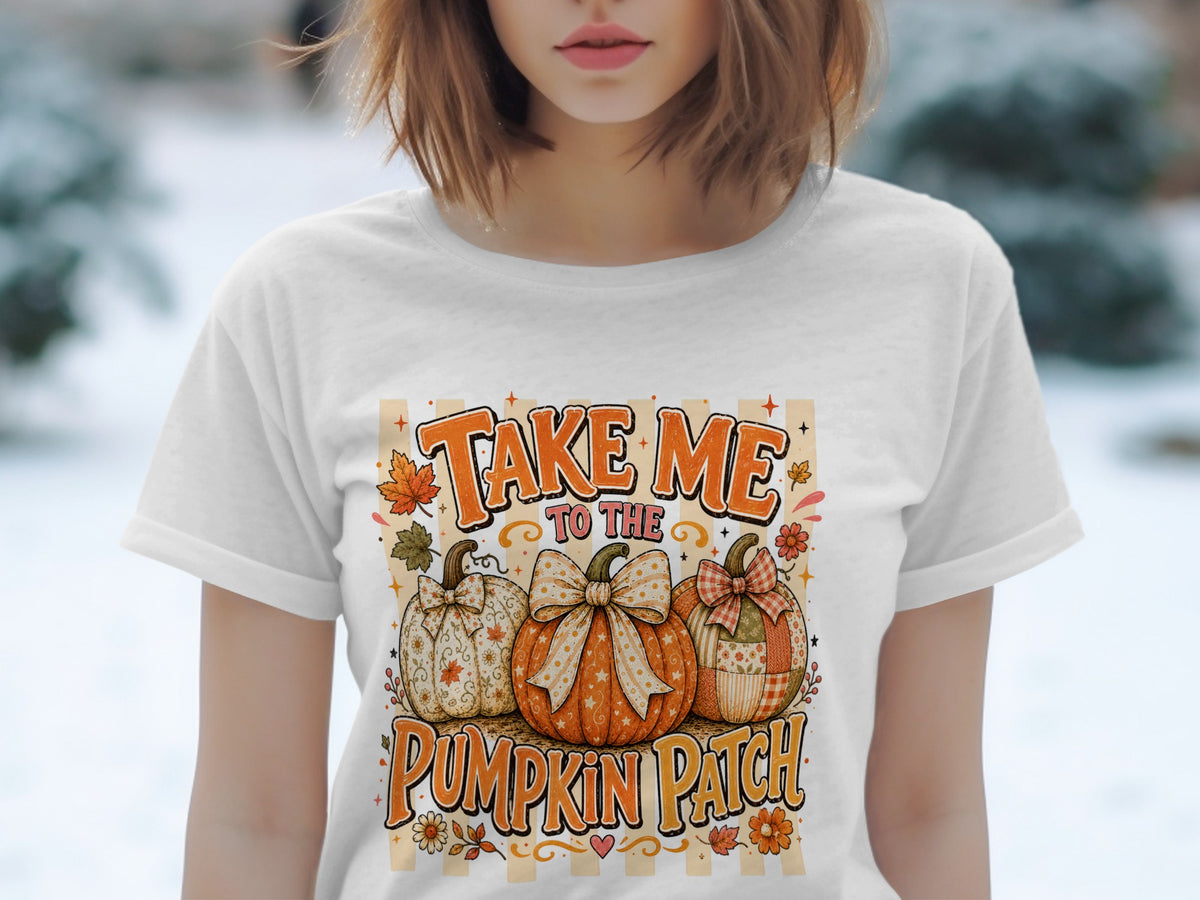 White t-shirt with "Take Me To The Pumpkin Patch" text and three decorative pumpkins.