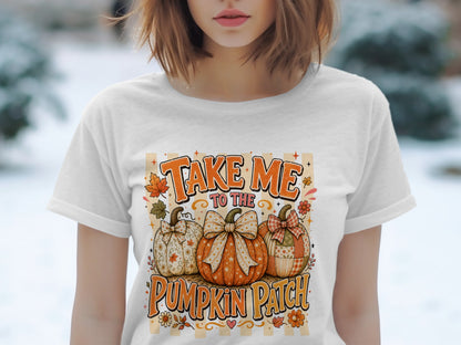 White t-shirt with "Take Me To The Pumpkin Patch" text and three decorative pumpkins.