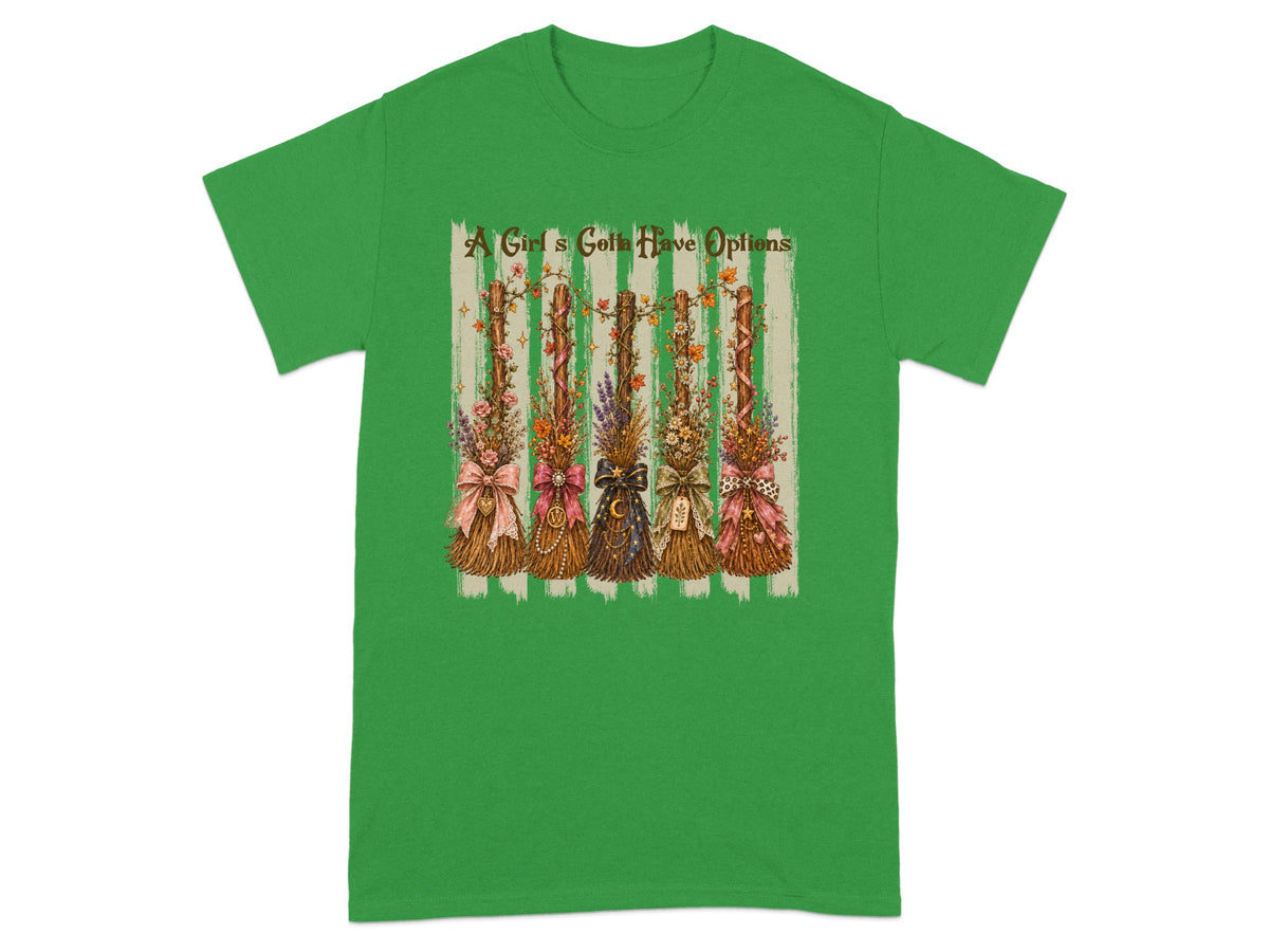 Green t-shirt with "A Girl's Gotta Have Options" and decorated brooms design.