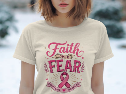 Cream t-shirt with pink text: "Faith Over Fear" and "Stronger in Hope Together in Faith".