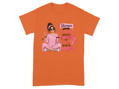 T-shirt with graphic of woman sitting, holding coffee, and text "Stronger Than You Think, Braver Than You Feel, Never Giving Up".