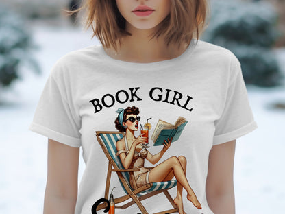 White t-shirt with "BOOK GIRL" text and vintage illustration of a woman reading.
